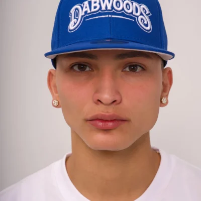 Closeup of the Dabwoods Blue Snapback